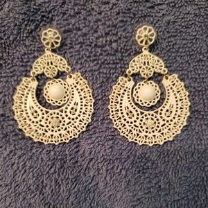 Beautiful white and rhinestone earrings. Very feminine and dressy.